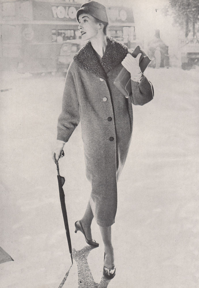 Women's fashion. Umbrella. Coat. Hat. Double-decker bus.. BRITISH VOGUE 1955